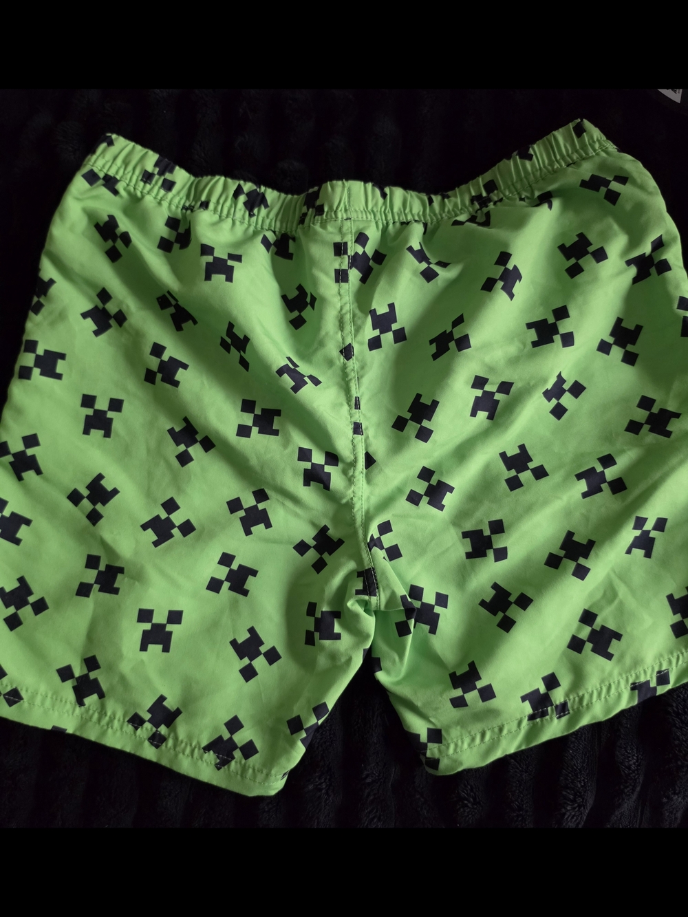 Kids Bright Green Patterned Swim Trunks with Black Accents